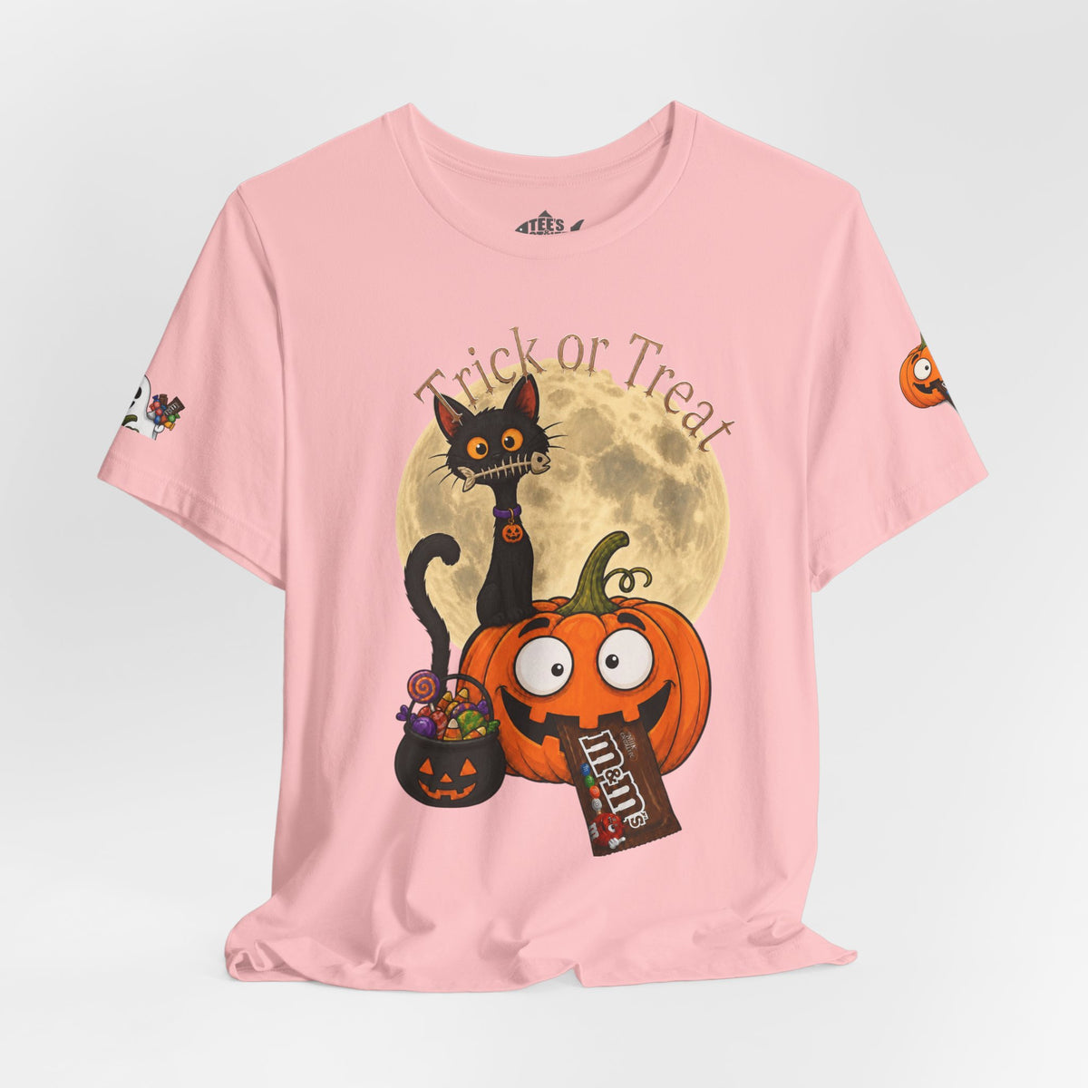 Light pink/ Back, Front design, Halloween T-shirt with a black cat orange pumpkin, full moon trick or treat candy bucket with candy and "Trick or Treat" text.